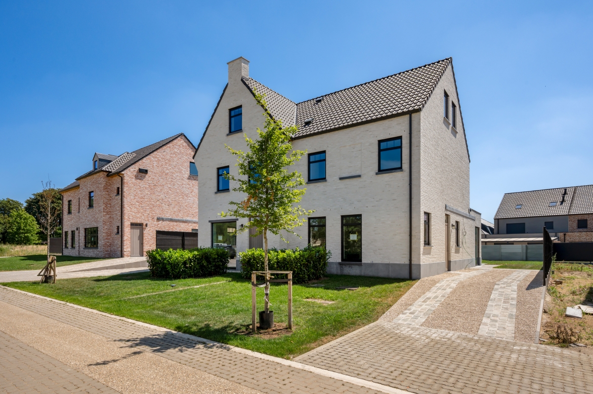 Verkaveling van een binnengebied in 22 loten, voor het bouwen van open en half-open bebouwingen.